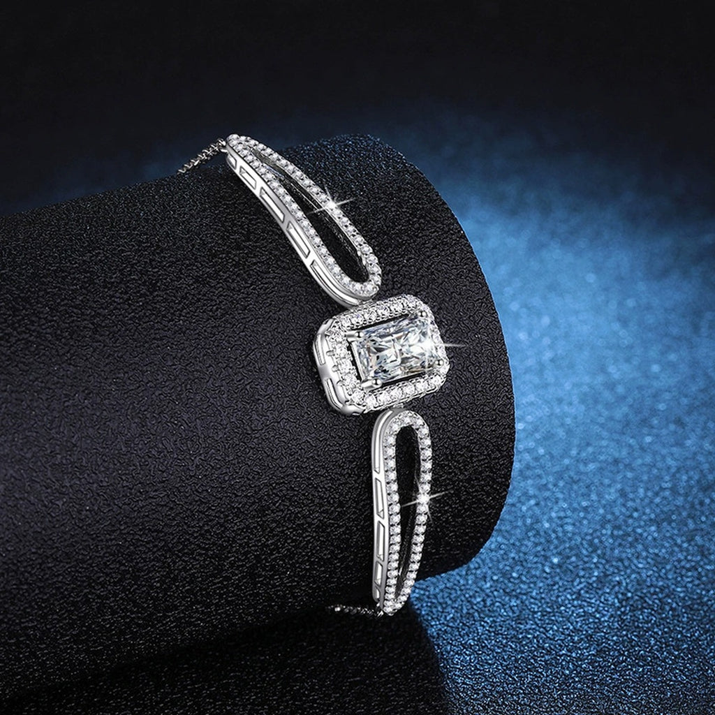 Pear Moissanite Adjustable Bangle Bracelet with CZ in White Gold-Plated S925 Sterling Silver blue display scene showing bracelet sparkle and chain detail