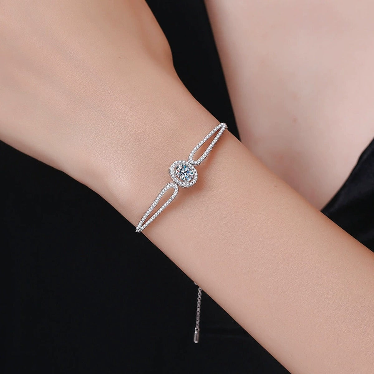Round Moissanite Adjustable Bangle Bracelet with CZ in White Gold-Plated S925 Sterling Silver worn on wrist model view showing scale and fit