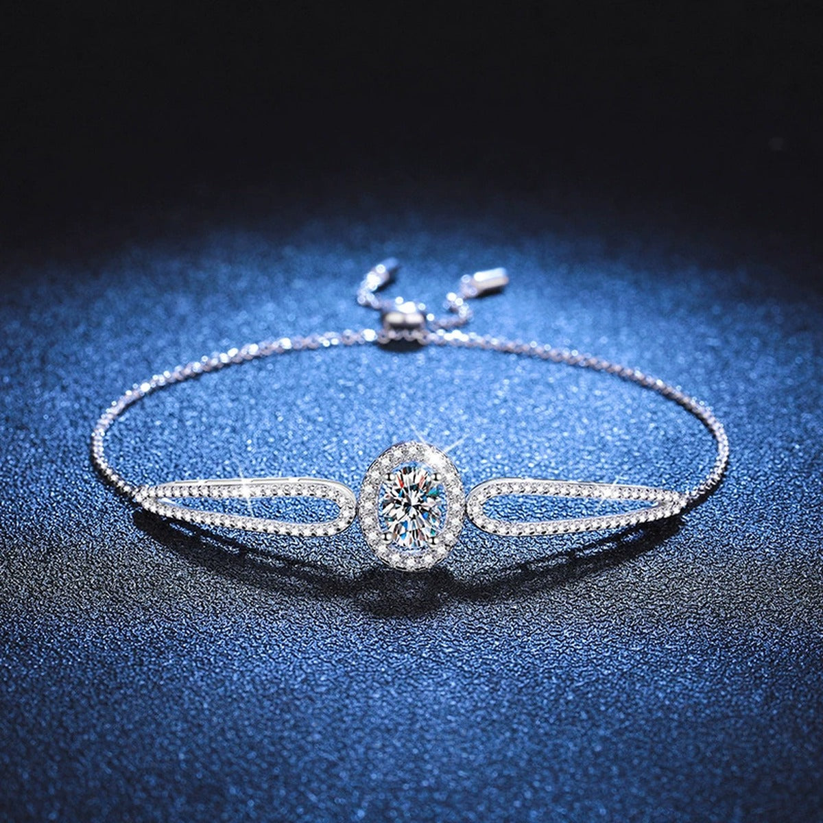 Round Moissanite Adjustable Bangle Bracelet with CZ in White Gold-Plated S925 Sterling Silver blue display scene showing bracelet sparkle and chain detail