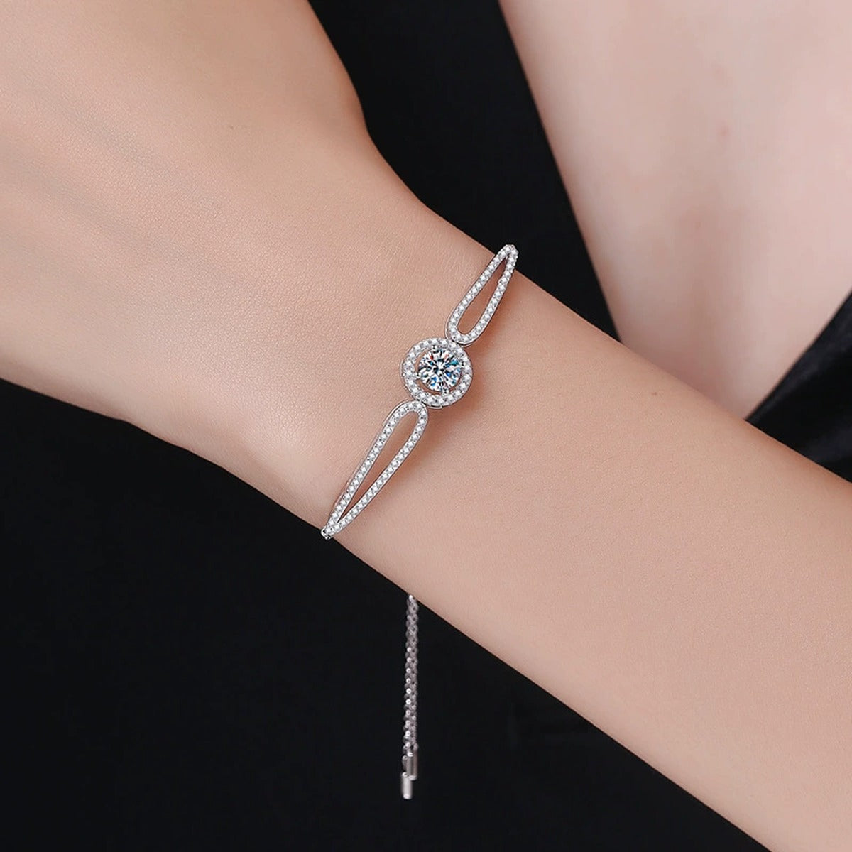 Round Halo Moissanite Adjustable Bangle Bracelet with CZ in White Gold-Plated S925 Sterling Silver worn on wrist model view showing scale and fit