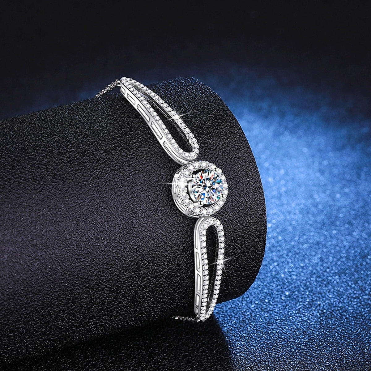 Round Halo Moissanite Adjustable Bangle Bracelet with CZ in White Gold-Plated S925 Sterling Silver blue display scene showing bracelet sparkle and chain detail