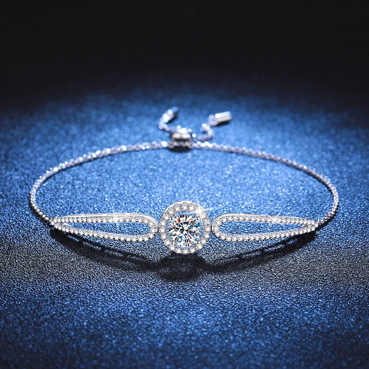 Round Halo Moissanite Adjustable Bangle Bracelet with CZ in White Gold-Plated S925 Sterling Silver blue display scene showing bracelet sparkle and chain detail