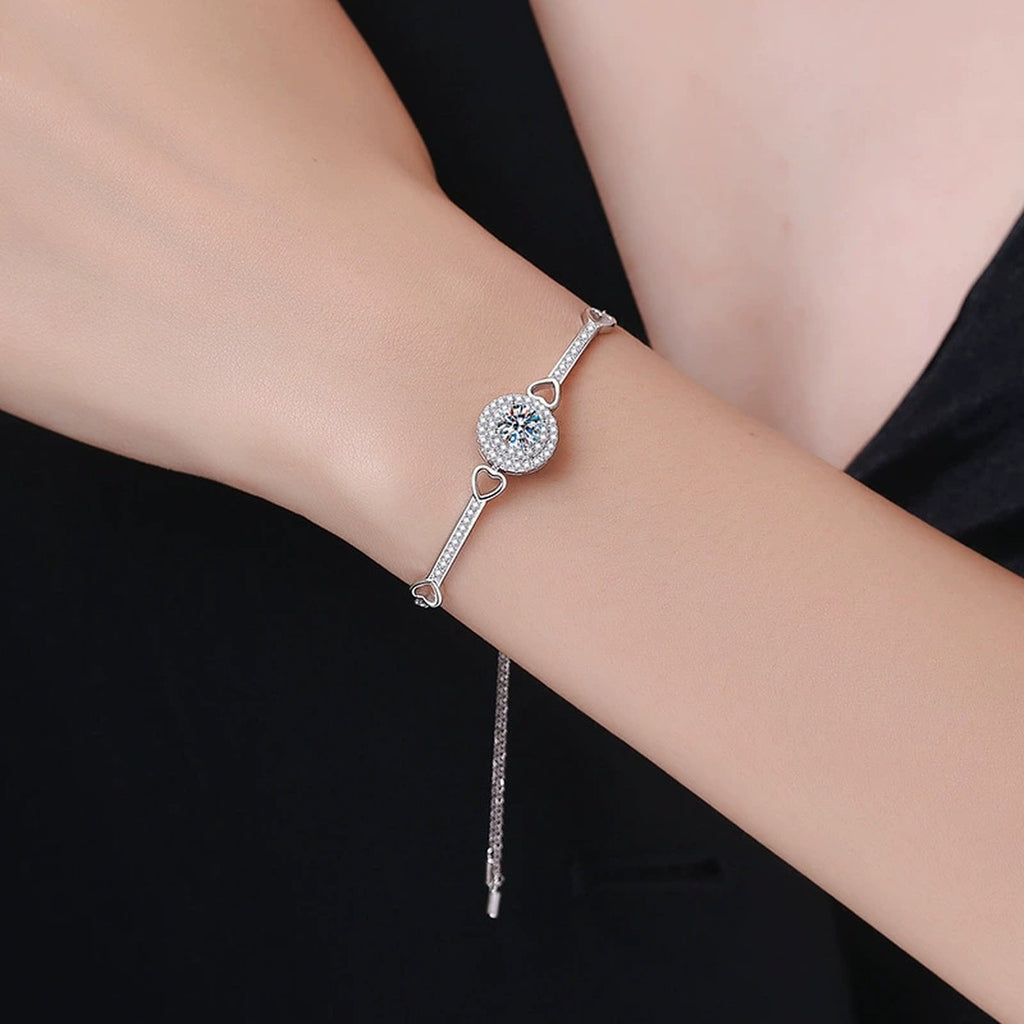 Round Halo Moissanite Adjustable Bangle Bracelet with CZ in White Gold-Plated S925 Sterling Silver worn on wrist model view showing scale and fit