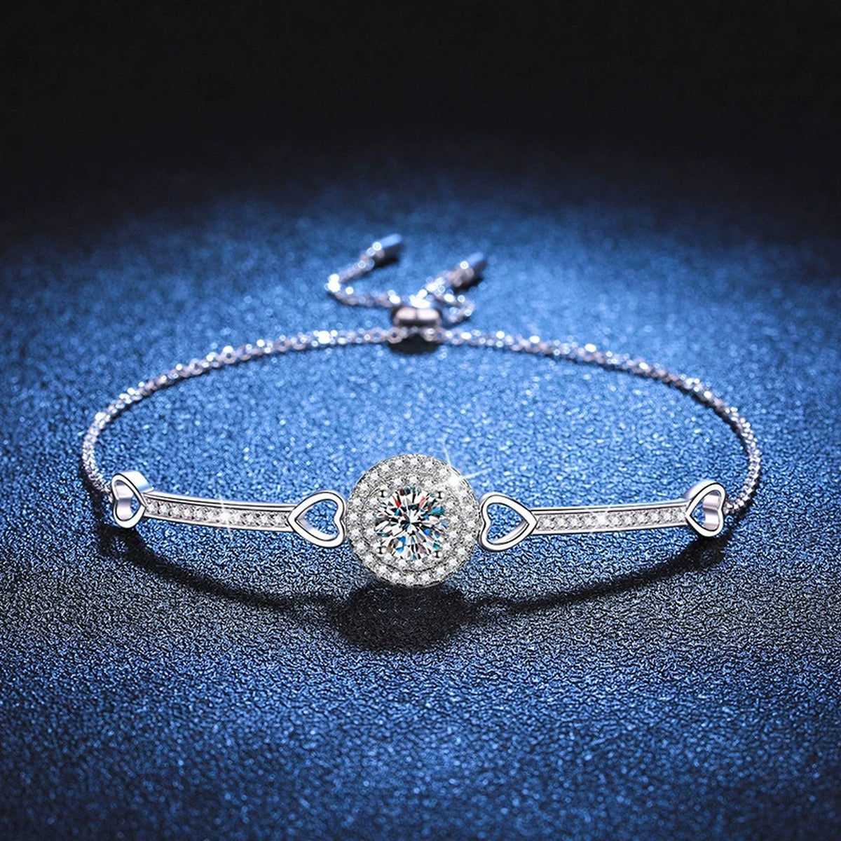 Round Halo Moissanite Adjustable Bangle Bracelet with CZ in White Gold-Plated S925 Sterling Silver blue display scene showing bracelet sparkle and chain detail