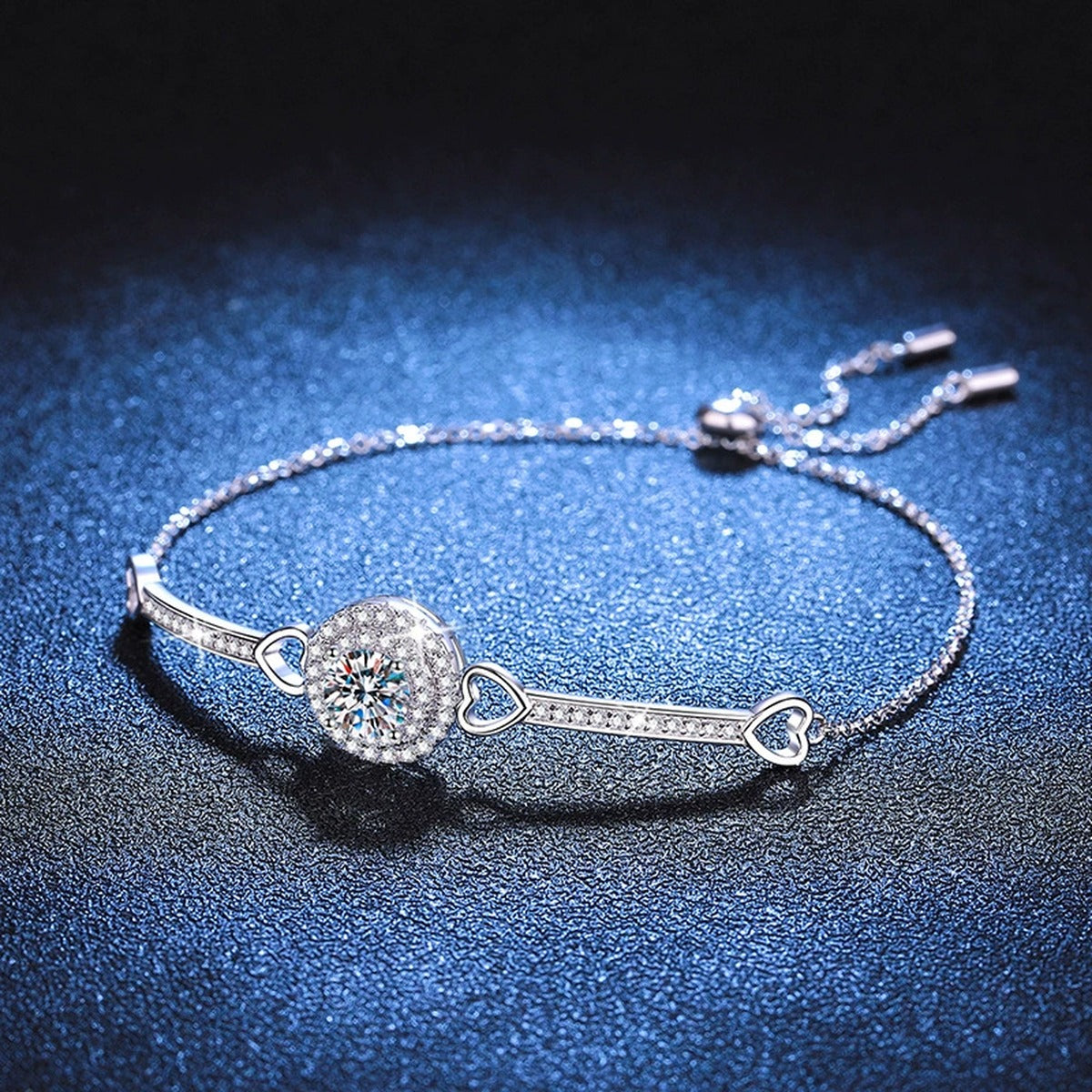 Round Halo Moissanite Adjustable Bangle Bracelet with CZ in White Gold-Plated S925 Sterling Silver blue display scene showing bracelet sparkle and chain detail