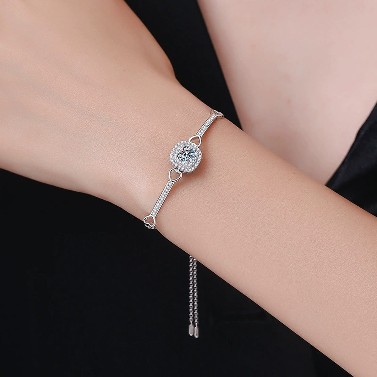 Round Moissanite Adjustable Bangle Bracelet with CZ in White Gold-Plated S925 Sterling Silver worn on wrist model view showing scale and fit