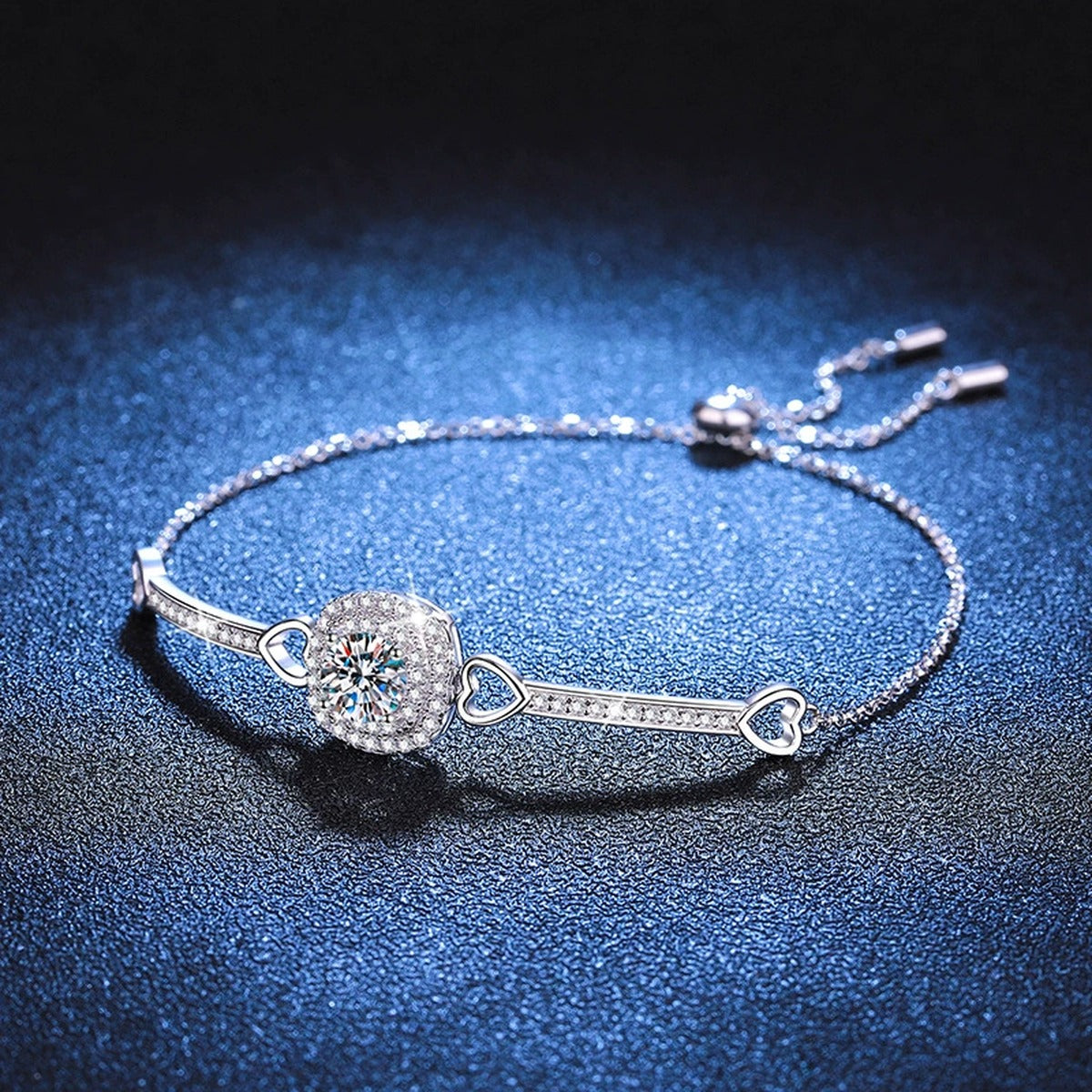 Round Moissanite Adjustable Bangle Bracelet with CZ in White Gold-Plated S925 Sterling Silver blue display scene showing bracelet sparkle and chain detail