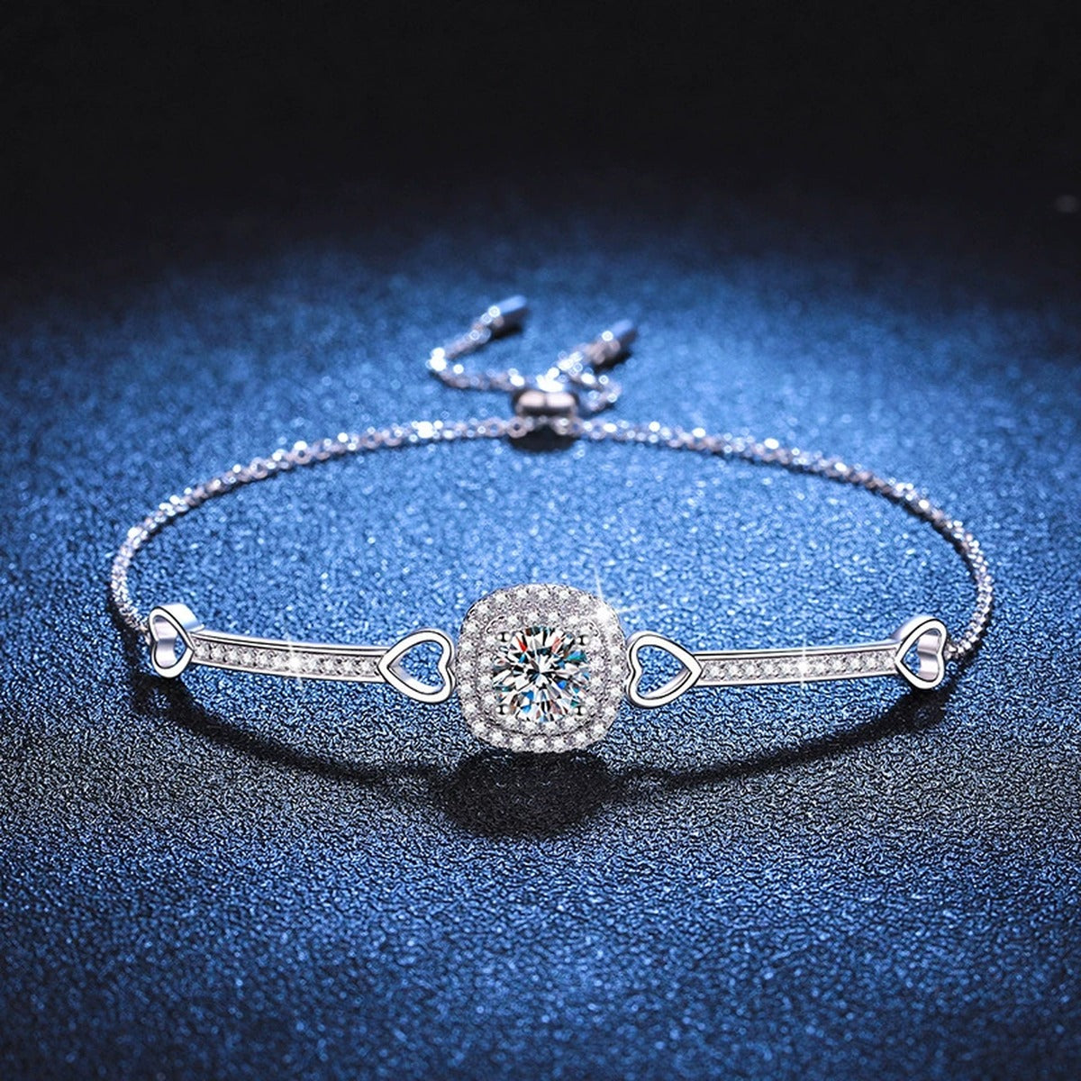 Round Moissanite Adjustable Bangle Bracelet with CZ in White Gold-Plated S925 Sterling Silver blue display scene showing bracelet sparkle and chain detail