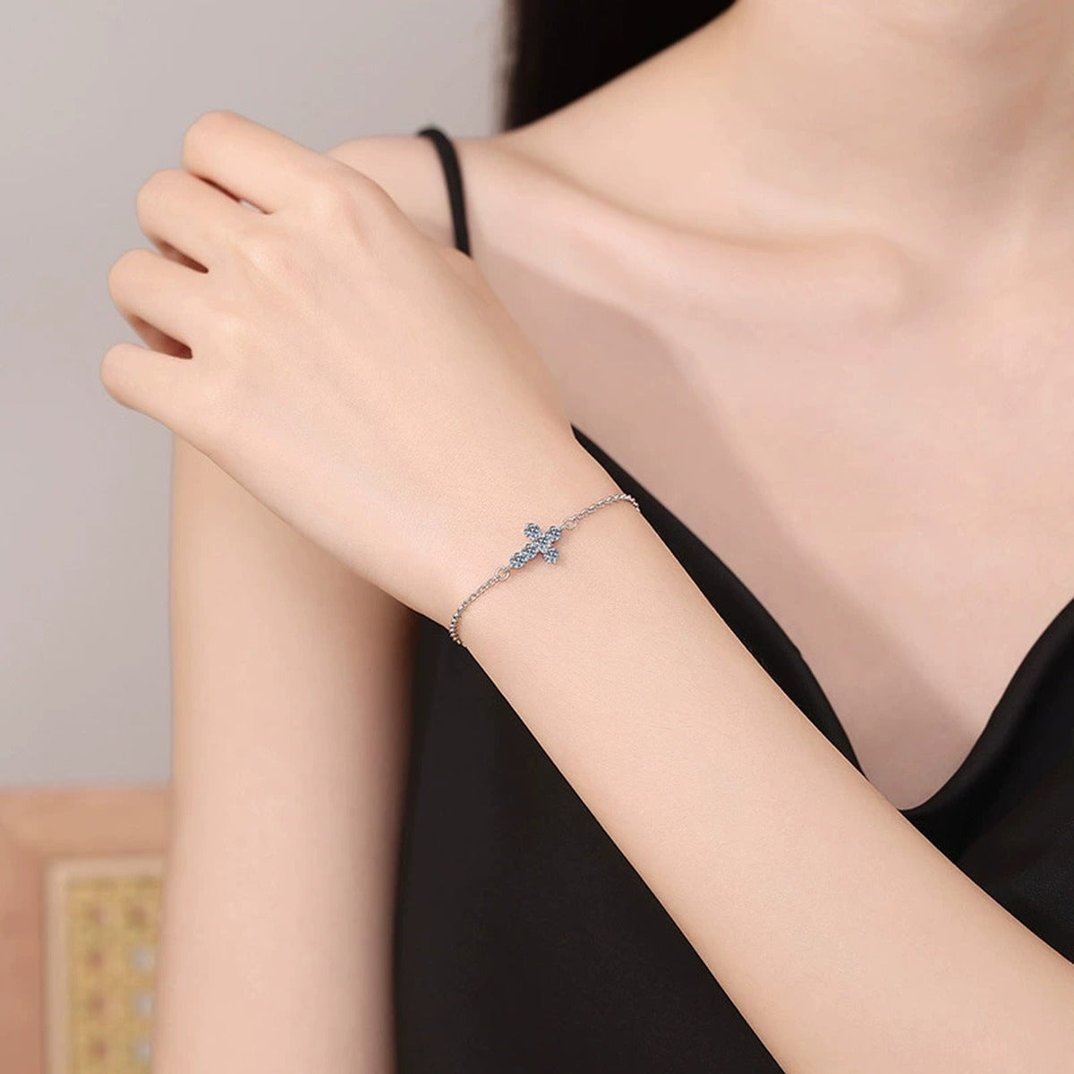 Cross Moissanite Chain Bracelet in White Gold-Plated S925 Sterling Silver worn on wrist model view showing scale and fit