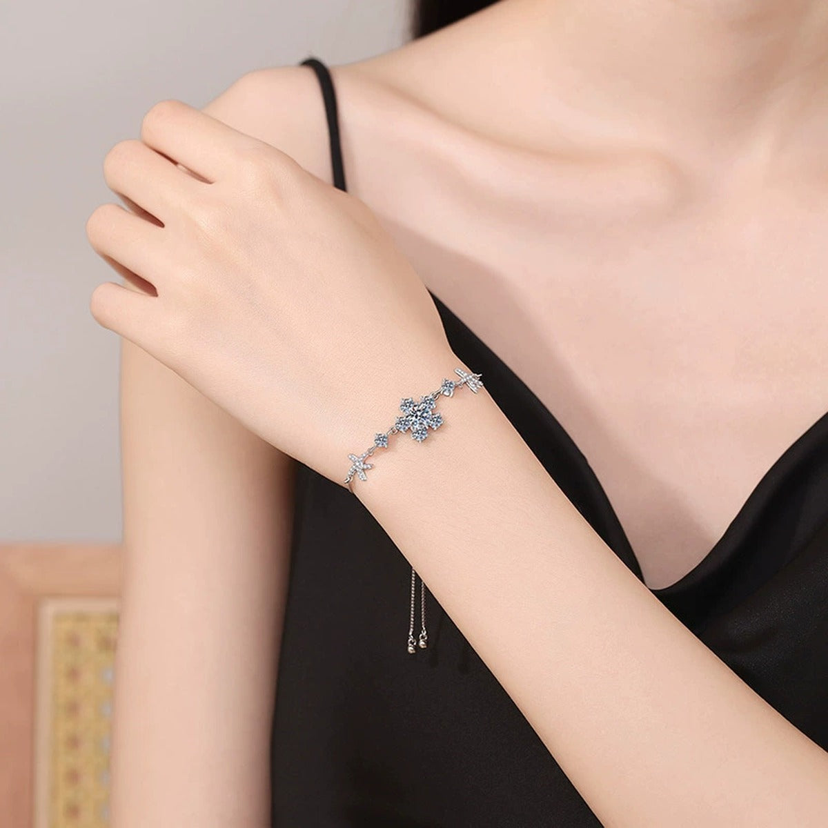 Floral Moissanite Adjustable Bracelet with CZ worn on wrist model view showing bracelet scale and fit
