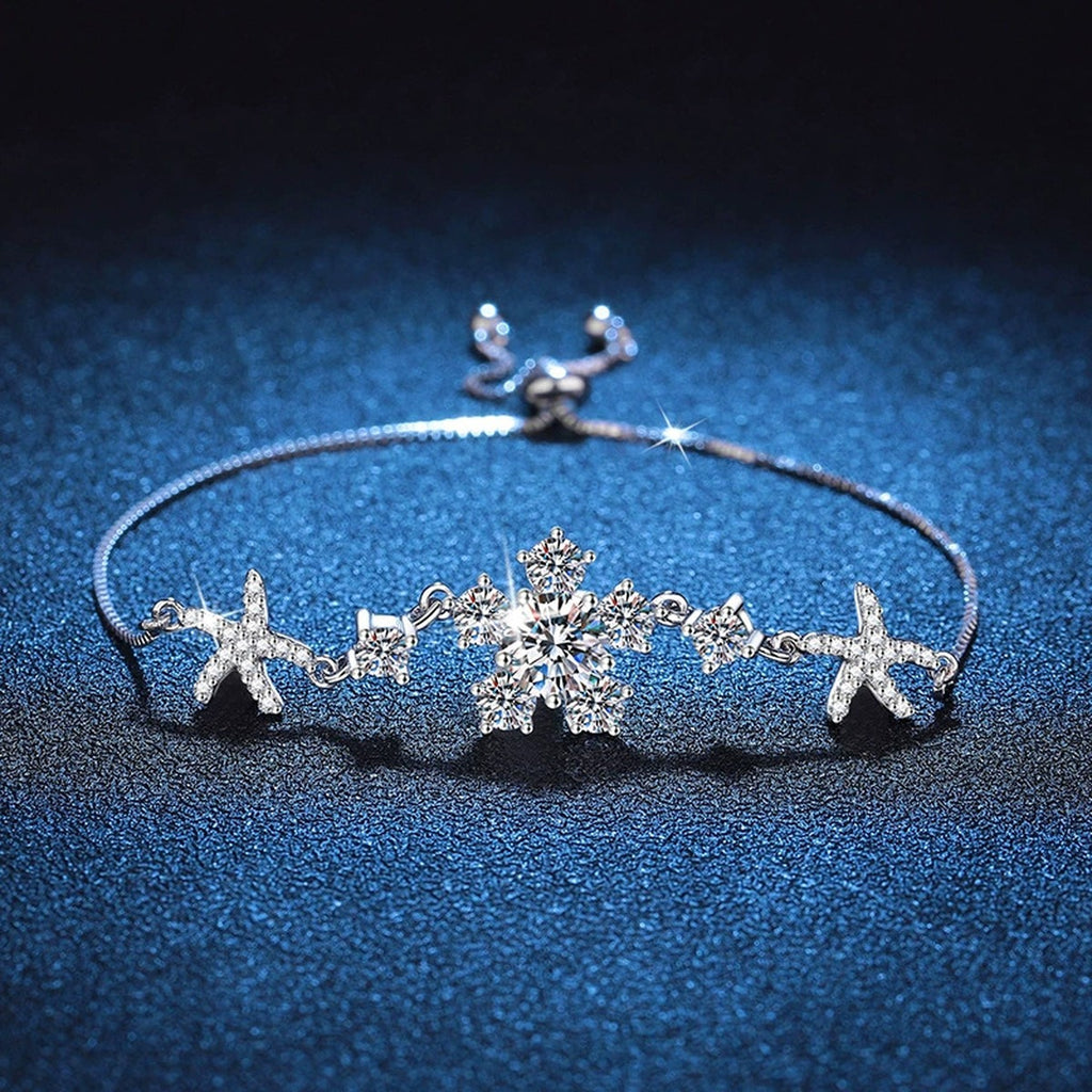 Floral Moissanite Adjustable Bracelet with CZ styled on blue display background showing moissanite sparkle and chain detail