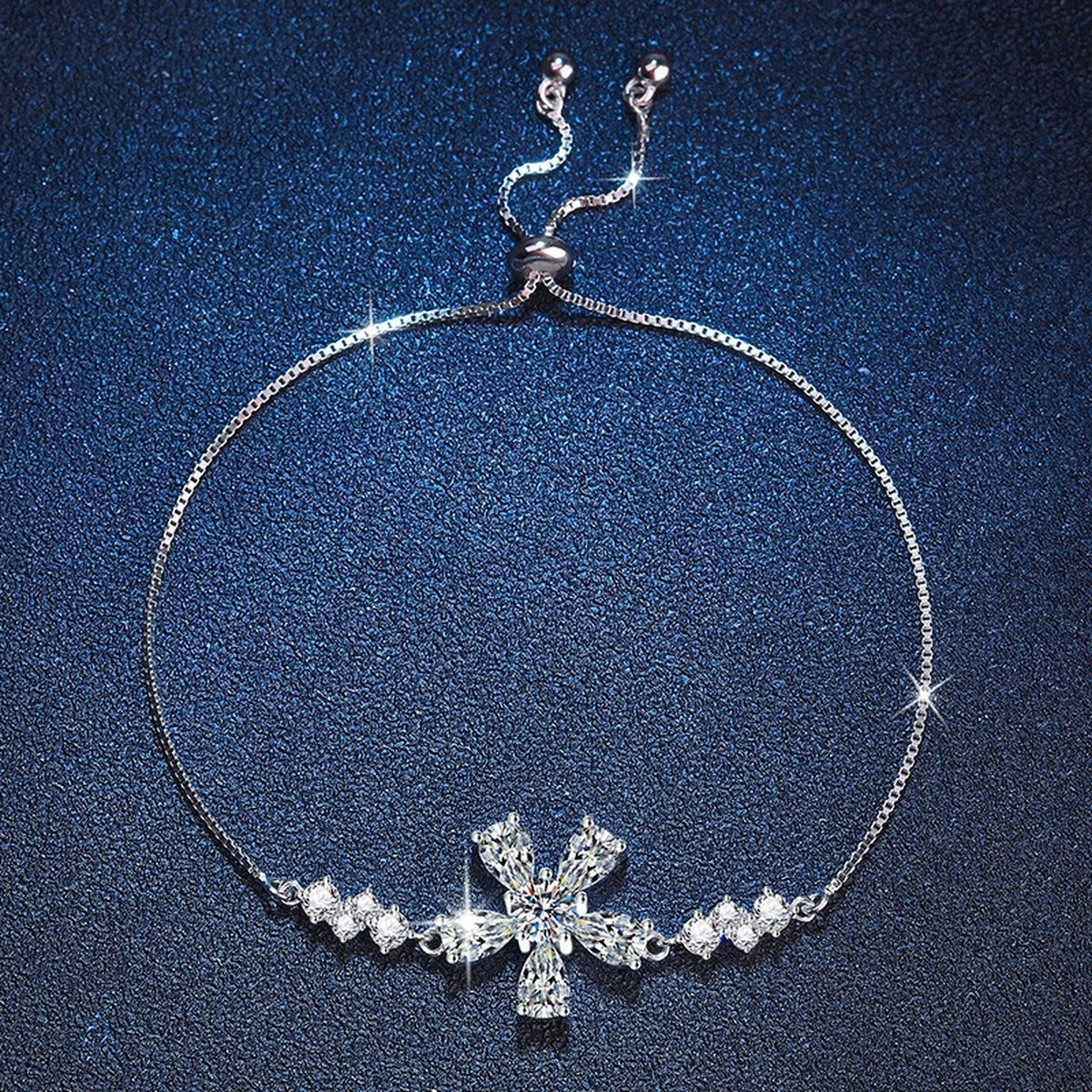 Snowflake Moissanite Chain Bracelet with CZ in White Gold-Plated S925 Sterling Silver blue display scene showing bracelet sparkle and chain detail