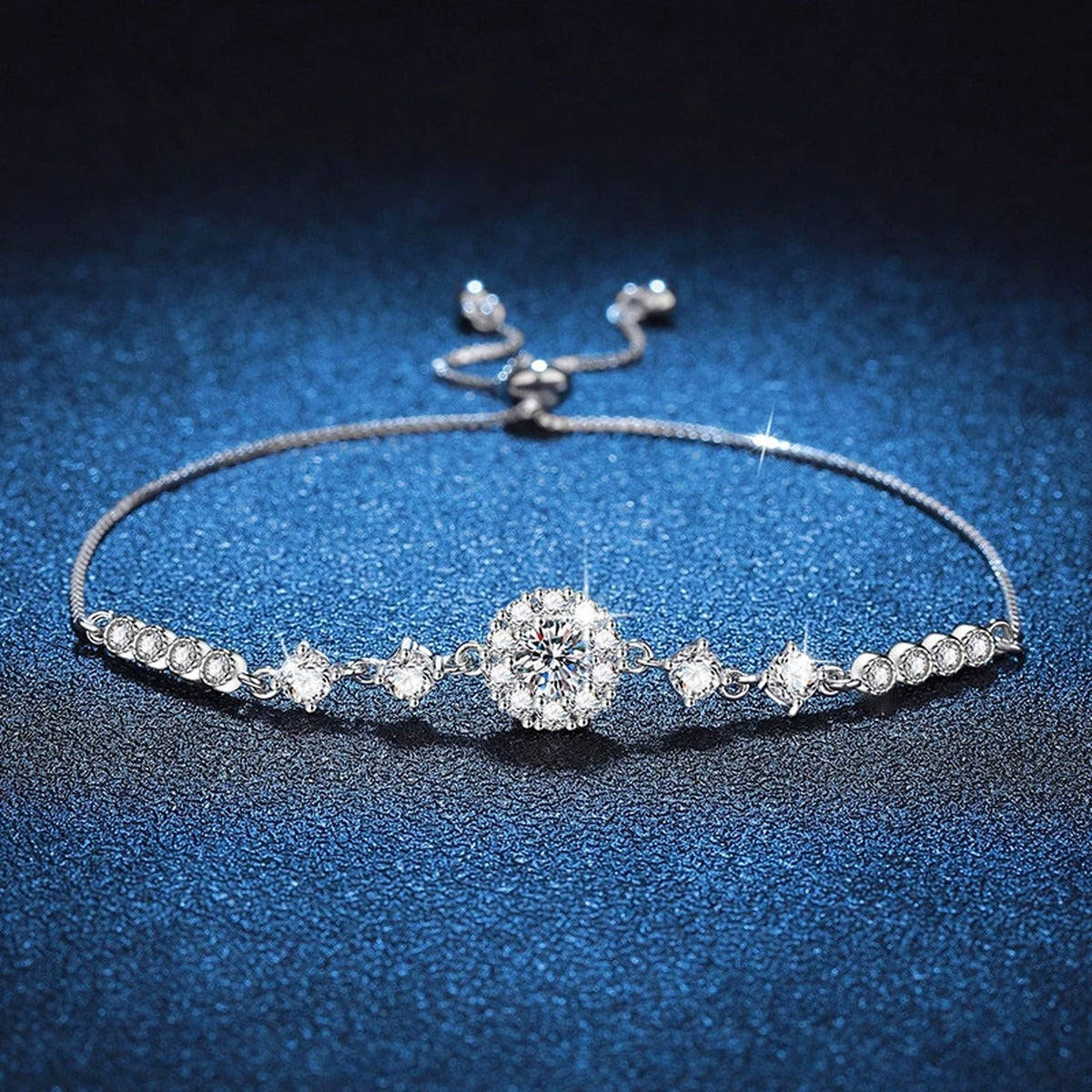 Clover Moissanite Chain Bracelet with CZ in White Gold-Plated S925 Sterling Silver blue display scene showing bracelet sparkle and chain detail