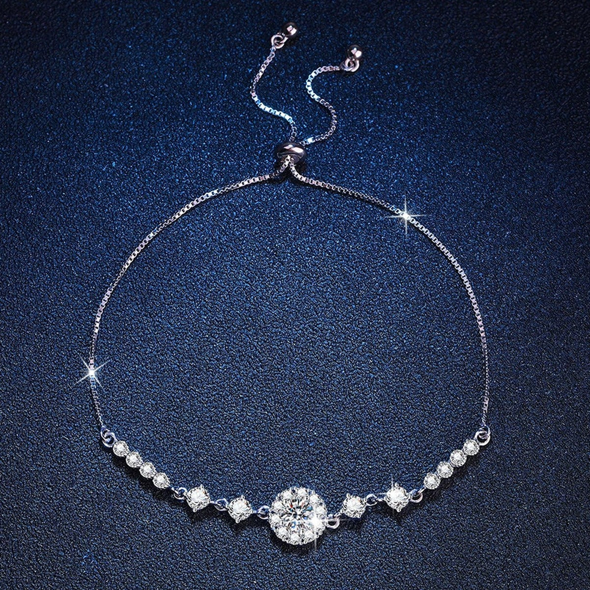 Clover Moissanite Chain Bracelet with CZ in White Gold-Plated S925 Sterling Silver blue display scene showing bracelet sparkle and chain detail