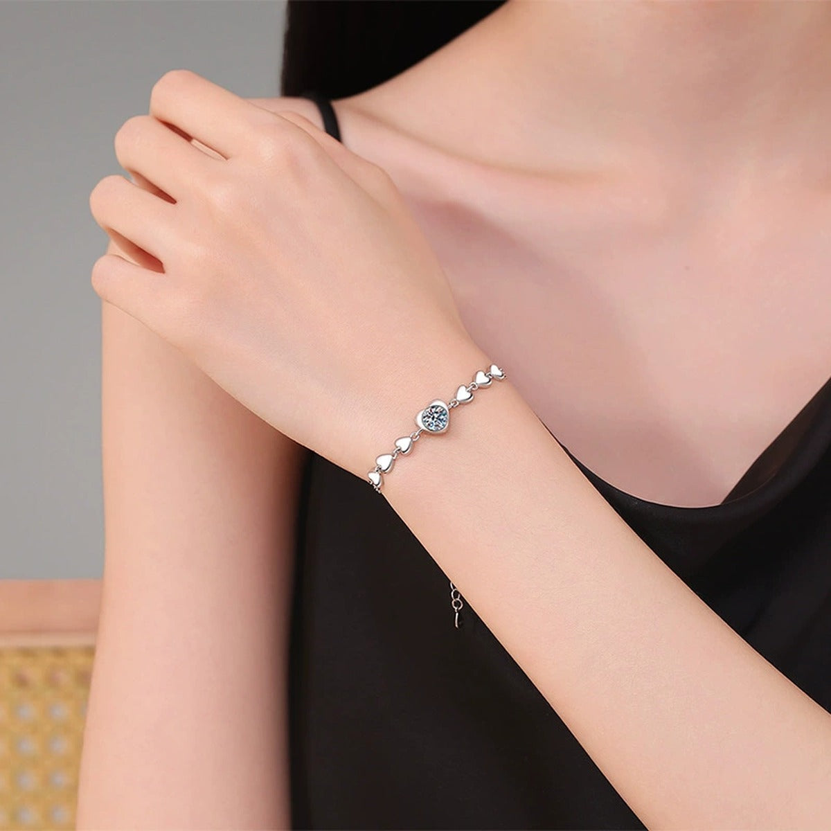 Round Moissanite Chain Bracelet in White Gold-Plated S925 Sterling Silver worn on wrist model view showing scale and fit