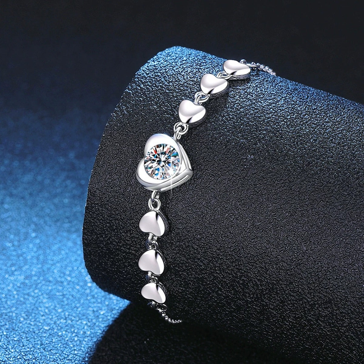 Round Moissanite Chain Bracelet in White Gold-Plated S925 Sterling Silver blue display scene showing bracelet sparkle and chain detail