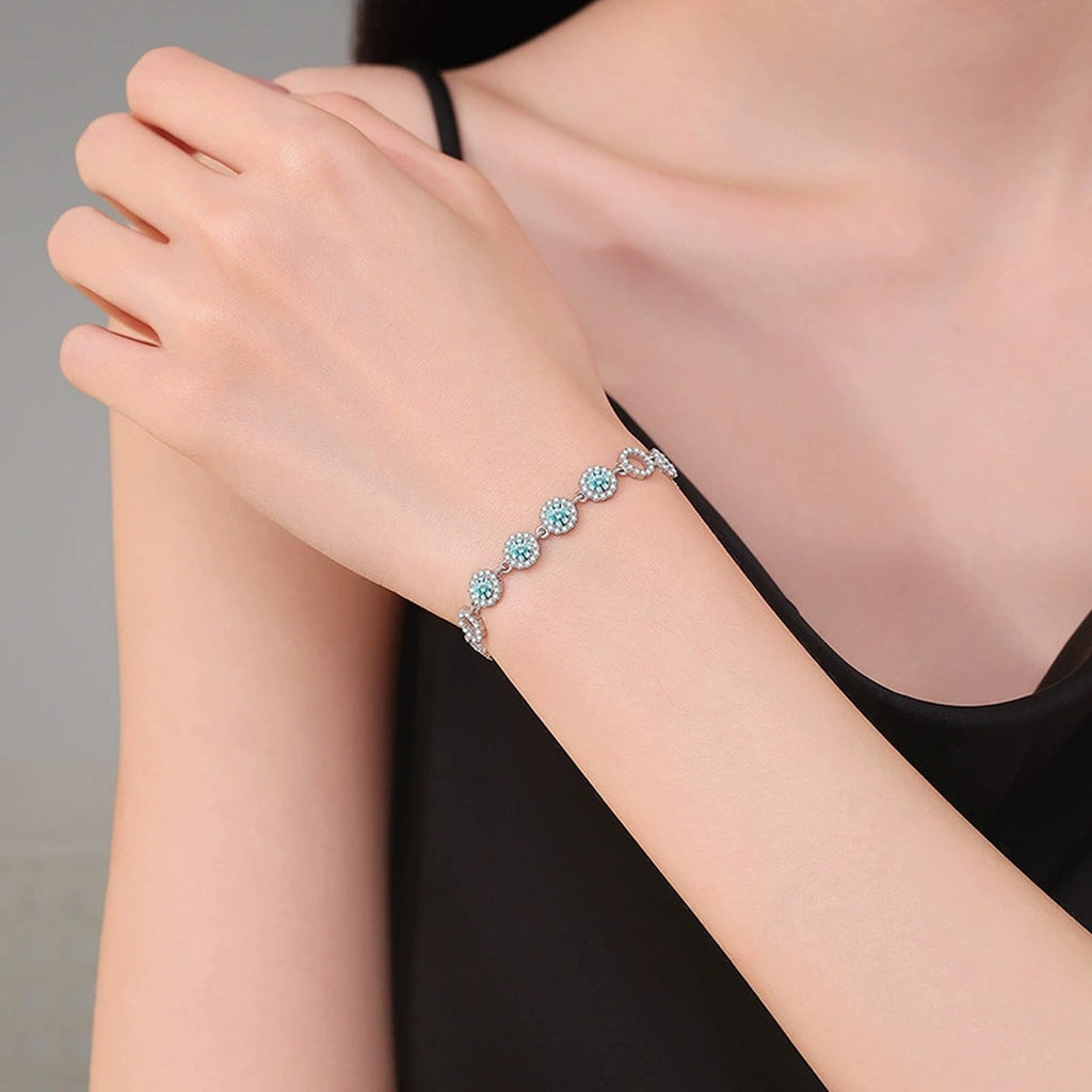 Aqua Moissanite Chain Bracelet with CZ in White Gold-Plated S925 Sterling Silver worn on wrist model view showing scale and fit