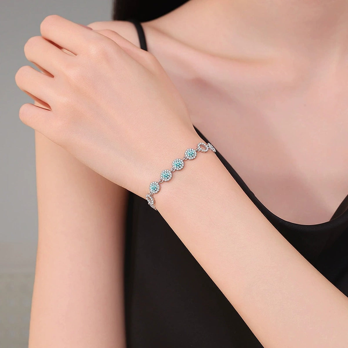 Aqua Moissanite Chain Bracelet with CZ in White Gold-Plated S925 Sterling Silver worn on wrist model view showing scale and fit