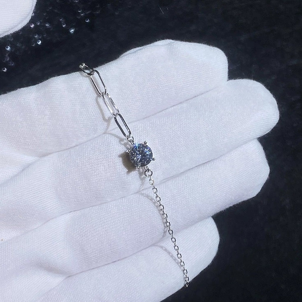 Round Moissanite Chain Bracelet in White Gold-Plated S925 Sterling Silver blue display scene showing bracelet sparkle and chain detail