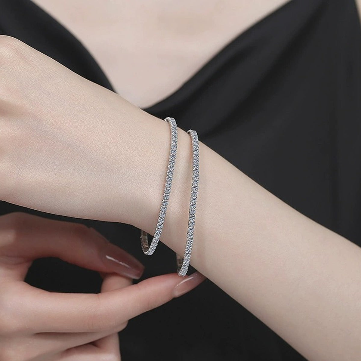 Moissanite Tennis Bangle Bracelet in White Gold-Plated S925 Sterling Silver worn on wrist model view showing scale and fit