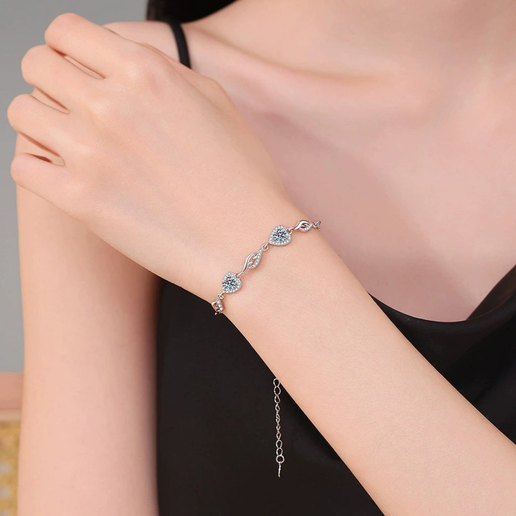 Graduated Moissanite Chain Bracelet with CZ in White Gold-Plated S925 Sterling Silver worn on wrist model view showing scale and fit