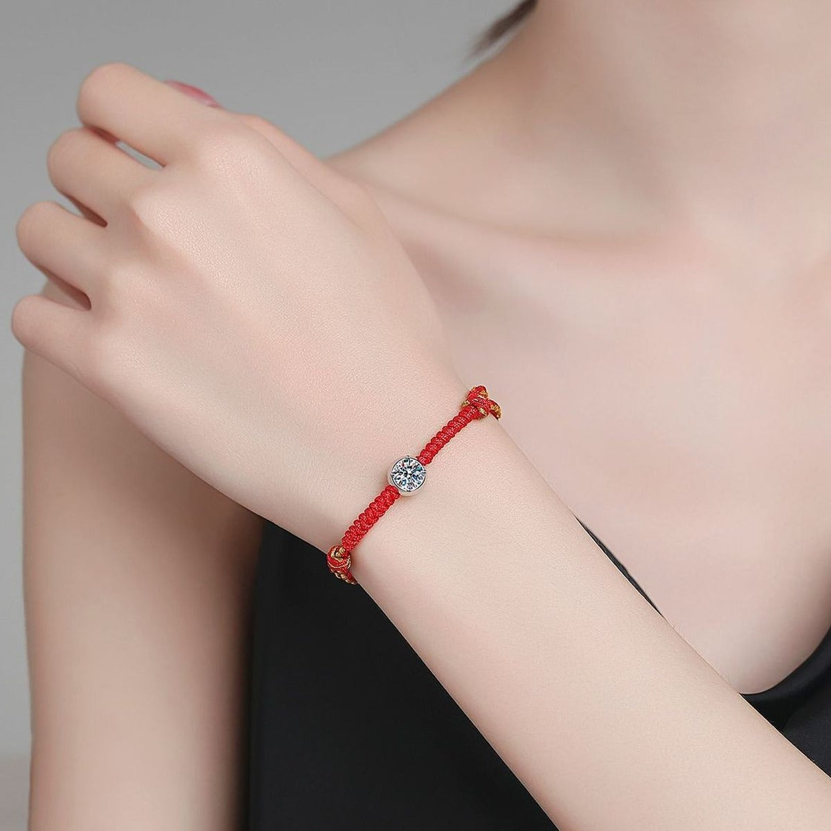 Red Cord Moissanite Bracelet in Gold-Plated S925 Sterling Silver worn on wrist model view showing scale and fit