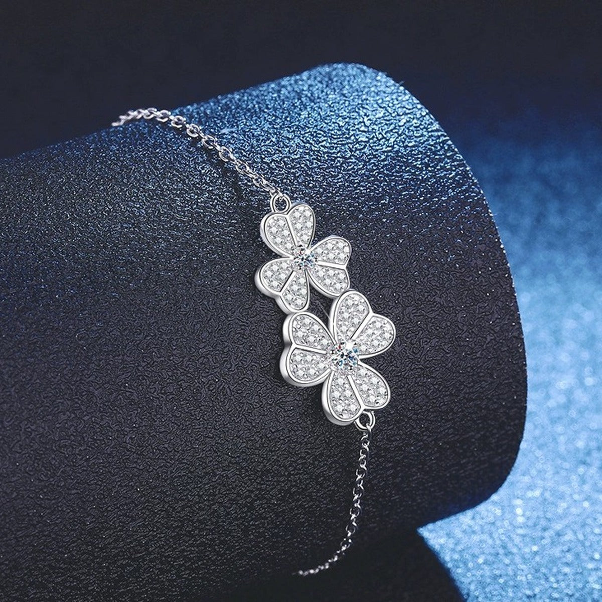 Cluster Moissanite Chain Bracelet in White Gold-Plated S925 Sterling Silver blue display scene showing bracelet sparkle and chain detail