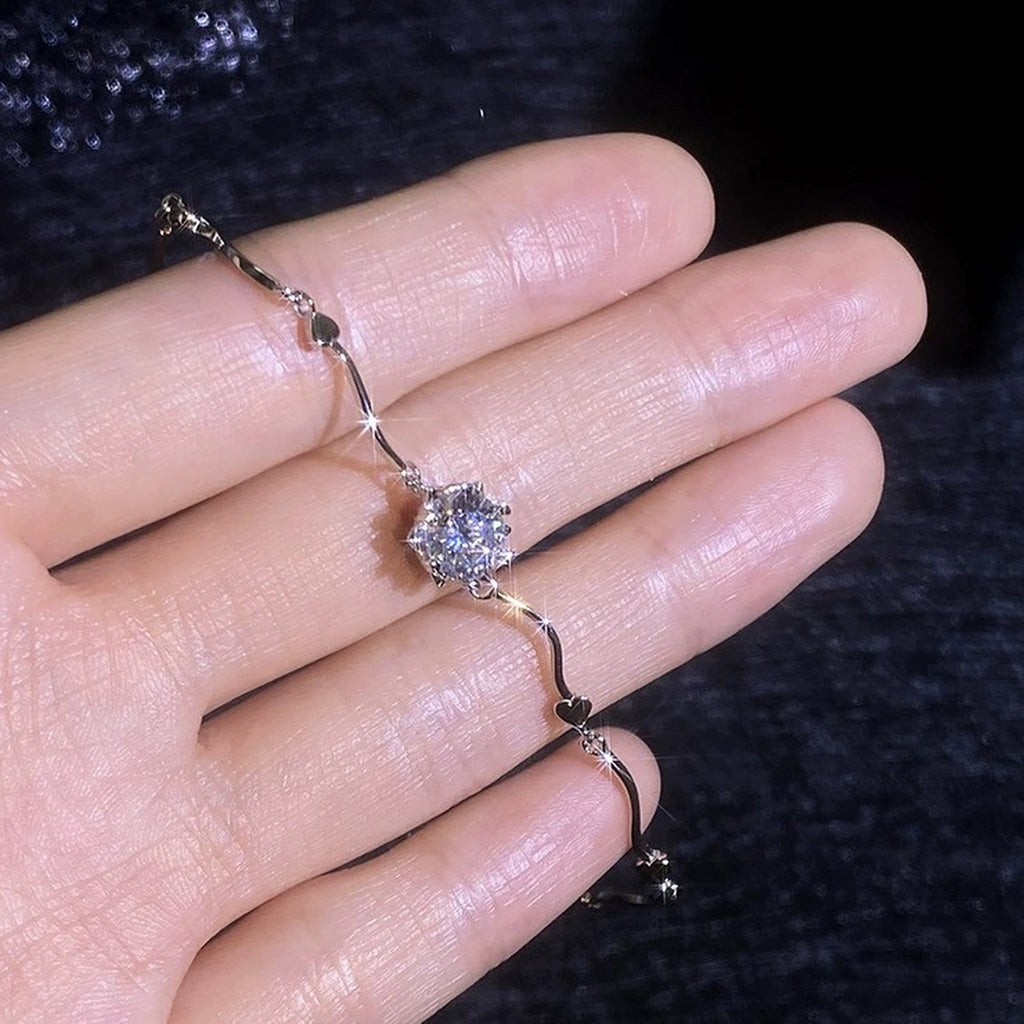 Round Moissanite Chain Bracelet in White Gold-Plated S925 Sterling Silver dark display close-up highlighting stone setting and metal finish