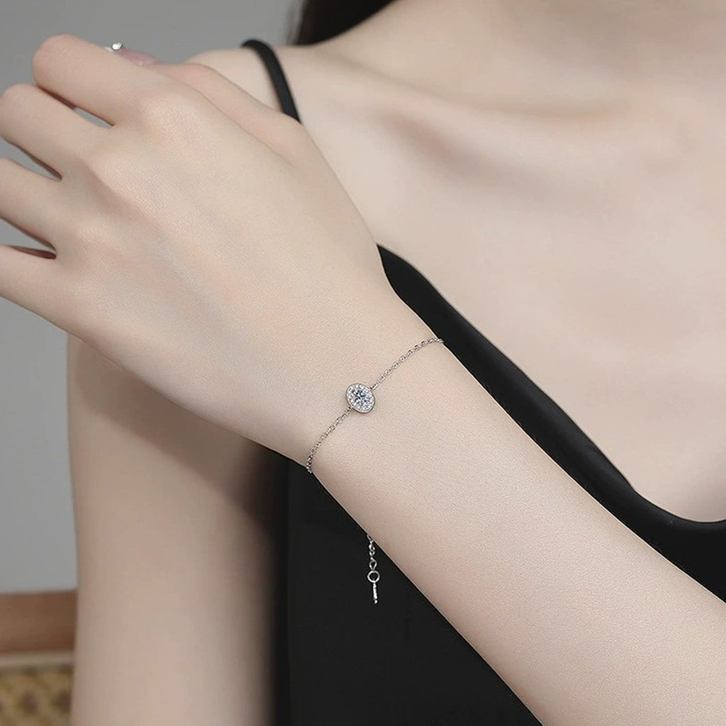 Round Moissanite Chain Bracelet with CZ in White Gold-Plated S925 Sterling Silver worn on wrist model view showing scale and fit