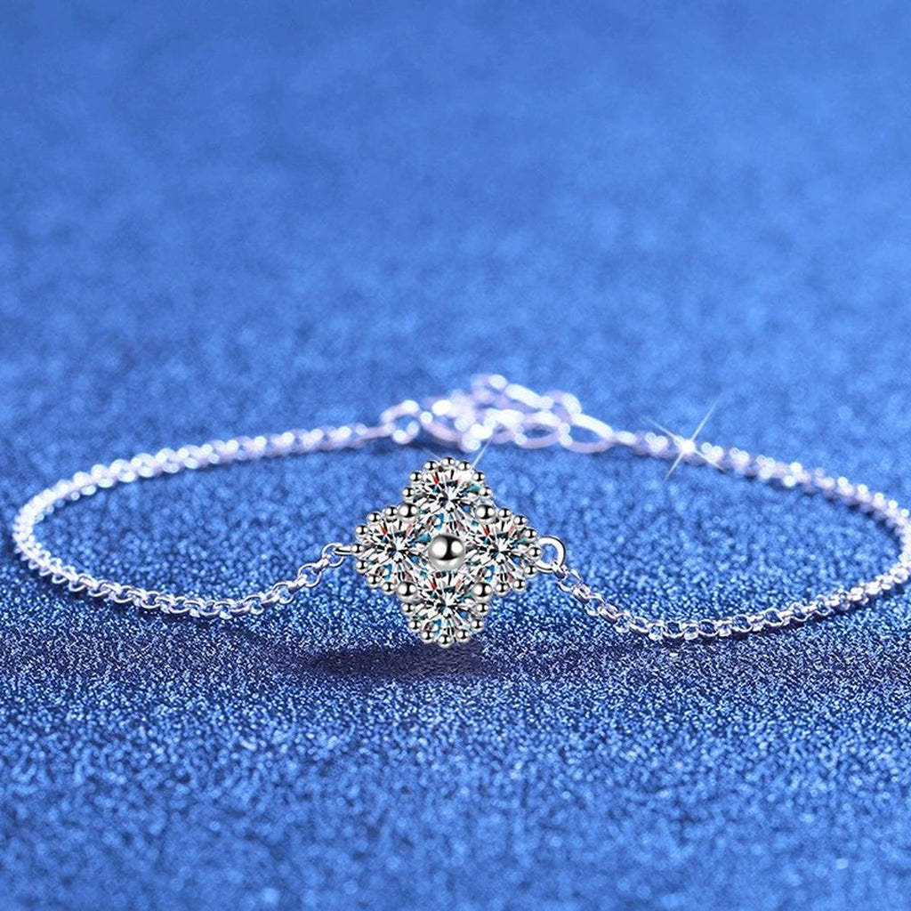Two-Tone Moissanite Chain Bracelet styled on blue display background showing moissanite sparkle and chain detail