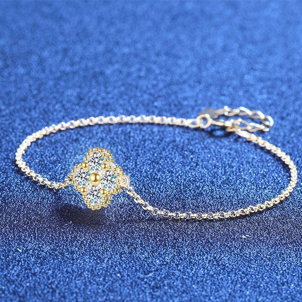 Two-Tone Moissanite Chain Bracelet styled on blue display background showing moissanite sparkle and chain detail