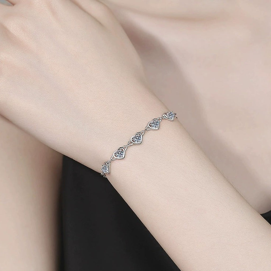 Heart Moissanite Station Bracelet worn on wrist model view showing bracelet scale and fit