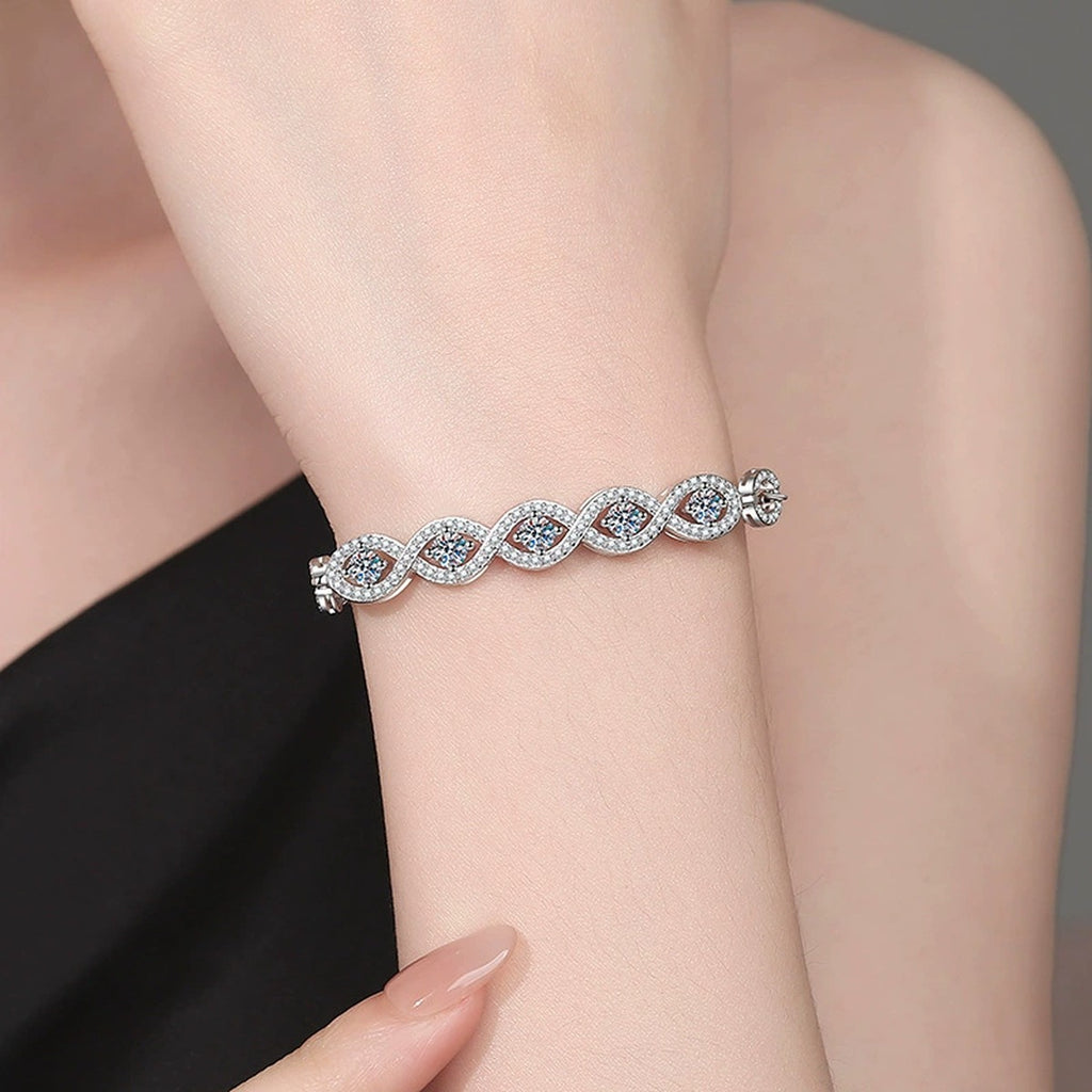 Oval Moissanite Bangle Bracelet with CZ worn on wrist model view showing bracelet scale and fit