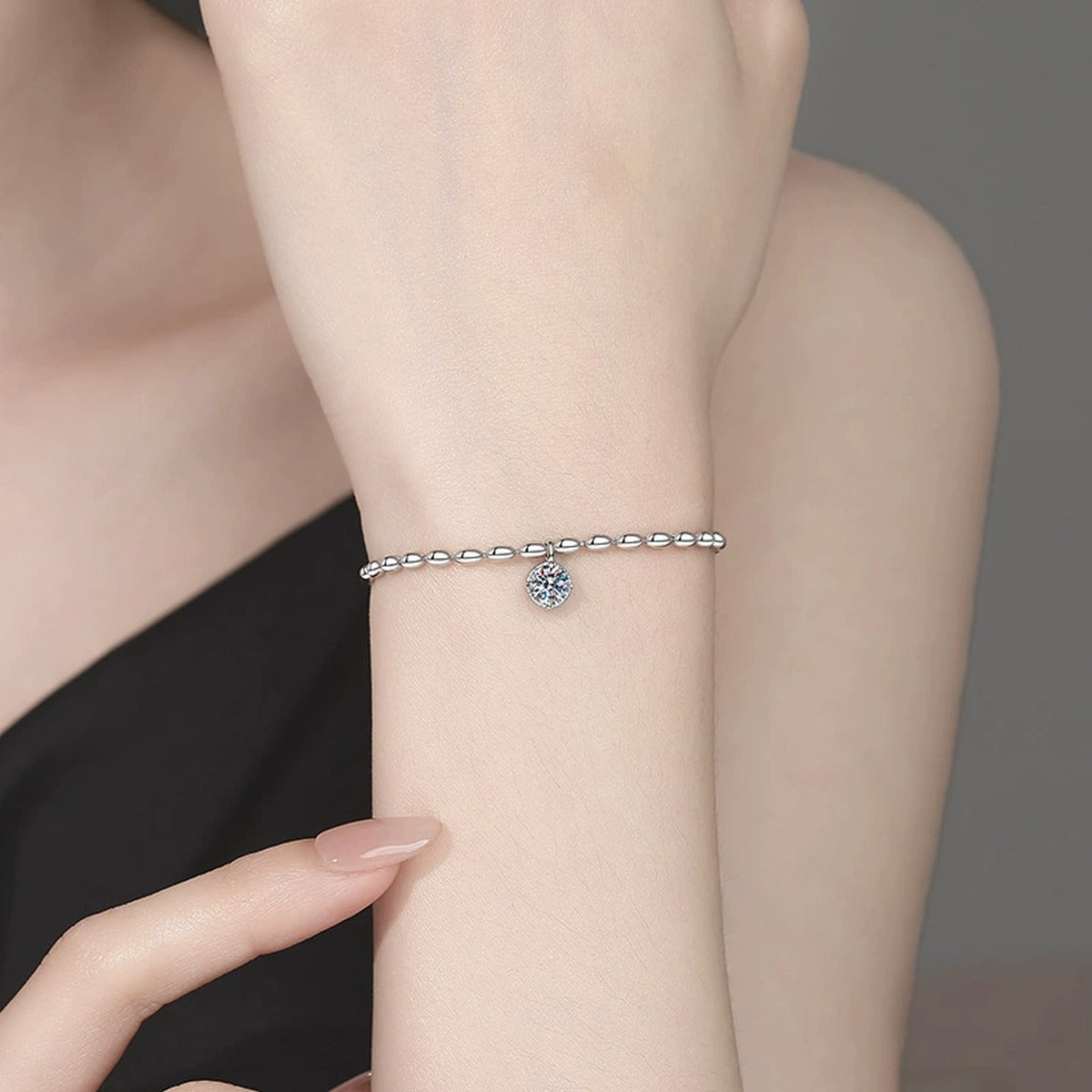 Pear Moissanite Chain Bracelet worn on wrist model view showing bracelet scale and fit