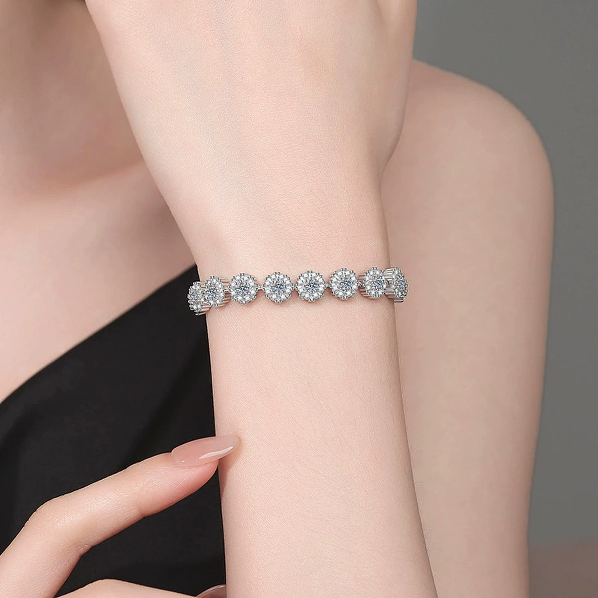 Round Moissanite Tennis Bracelet with CZ worn on wrist model view showing bracelet scale and fit
