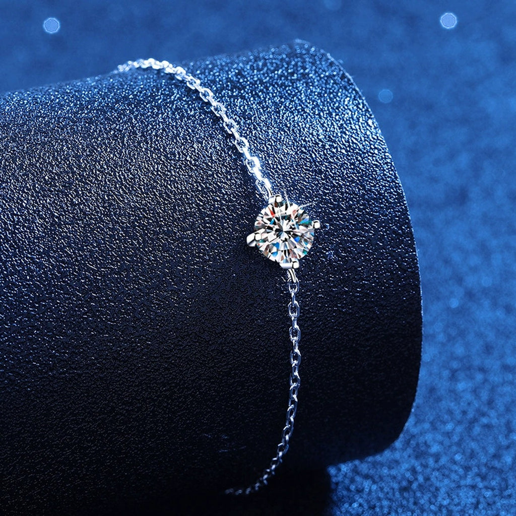 Round Moissanite Chain Bracelet styled on blue display background showing moissanite sparkle and chain detail