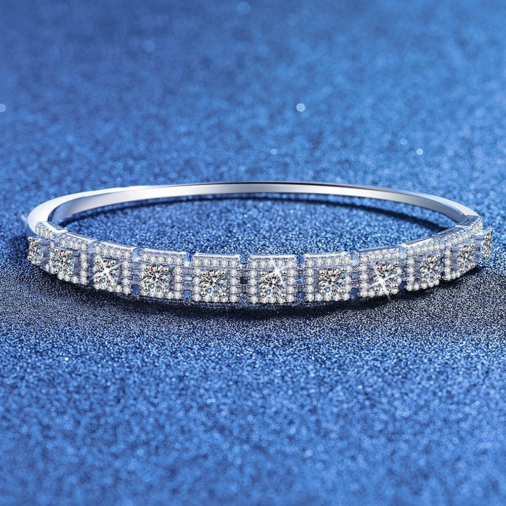 Three-Row Moissanite Bangle Bracelet styled on blue display background showing moissanite sparkle and chain detail