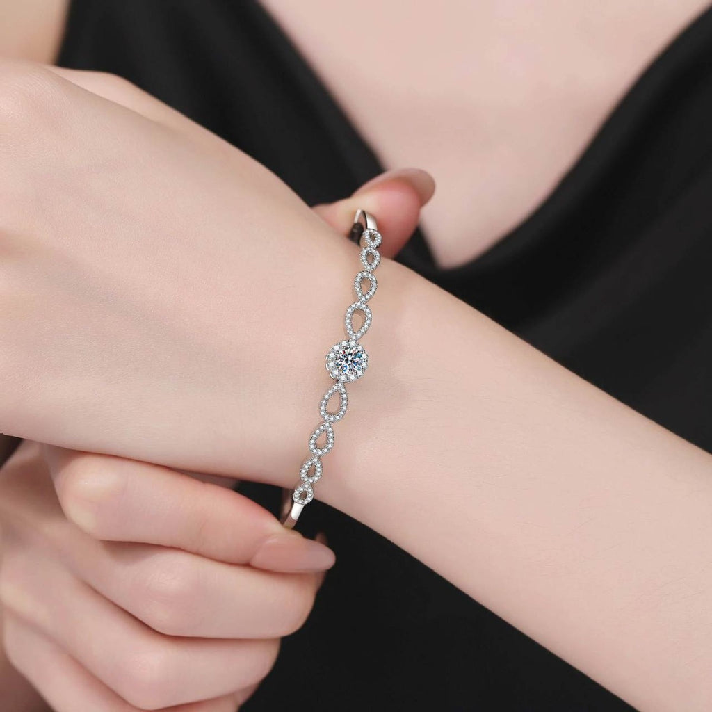 Round Moissanite Bangle Bracelet with CZ worn on wrist model view showing bracelet scale and fit