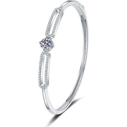 Paperclip Moissanite Bangle Bracelet with CZ white background product photo showing bracelet silhouette and moissanite setting