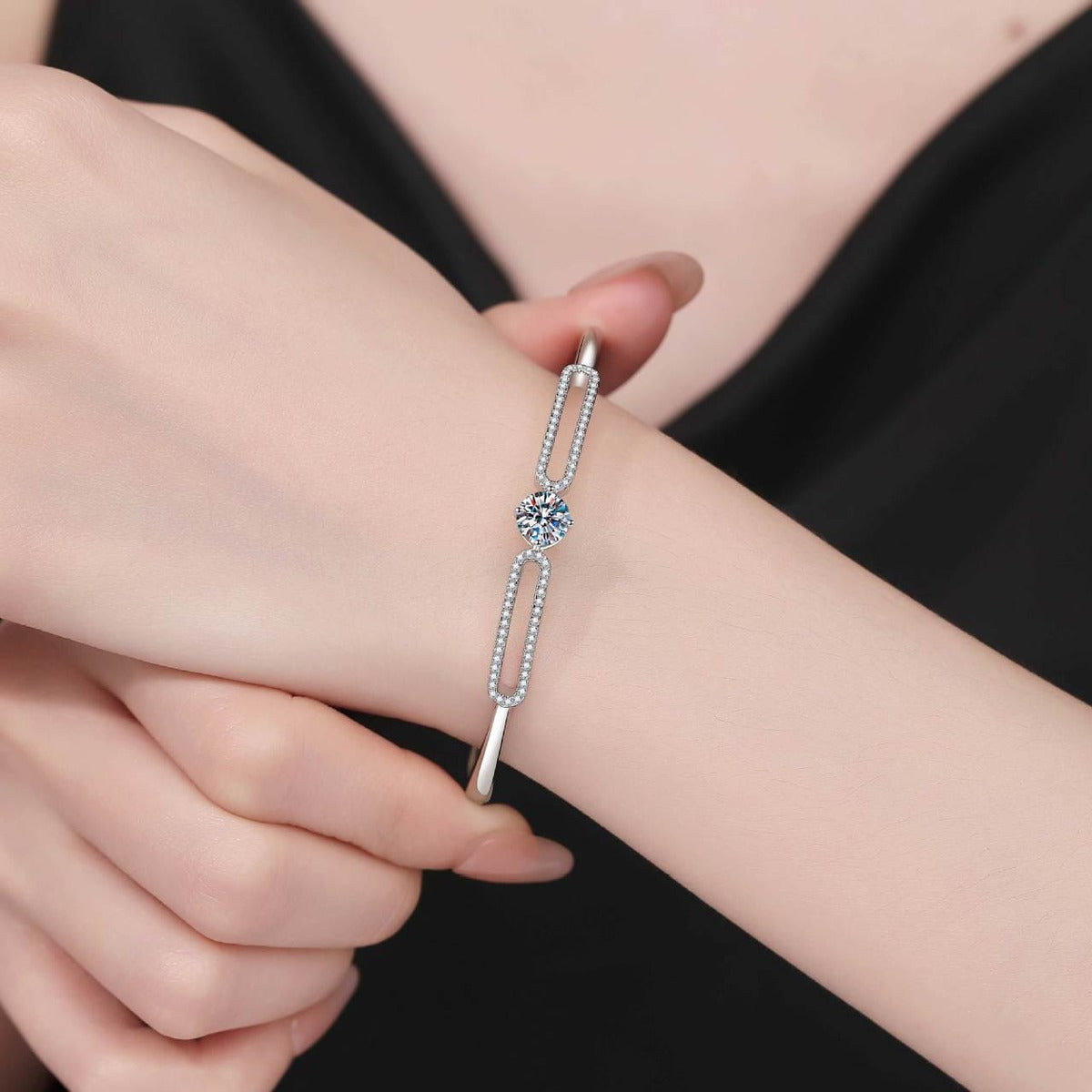 Paperclip Moissanite Bangle Bracelet with CZ worn on wrist model view showing bracelet scale and fit