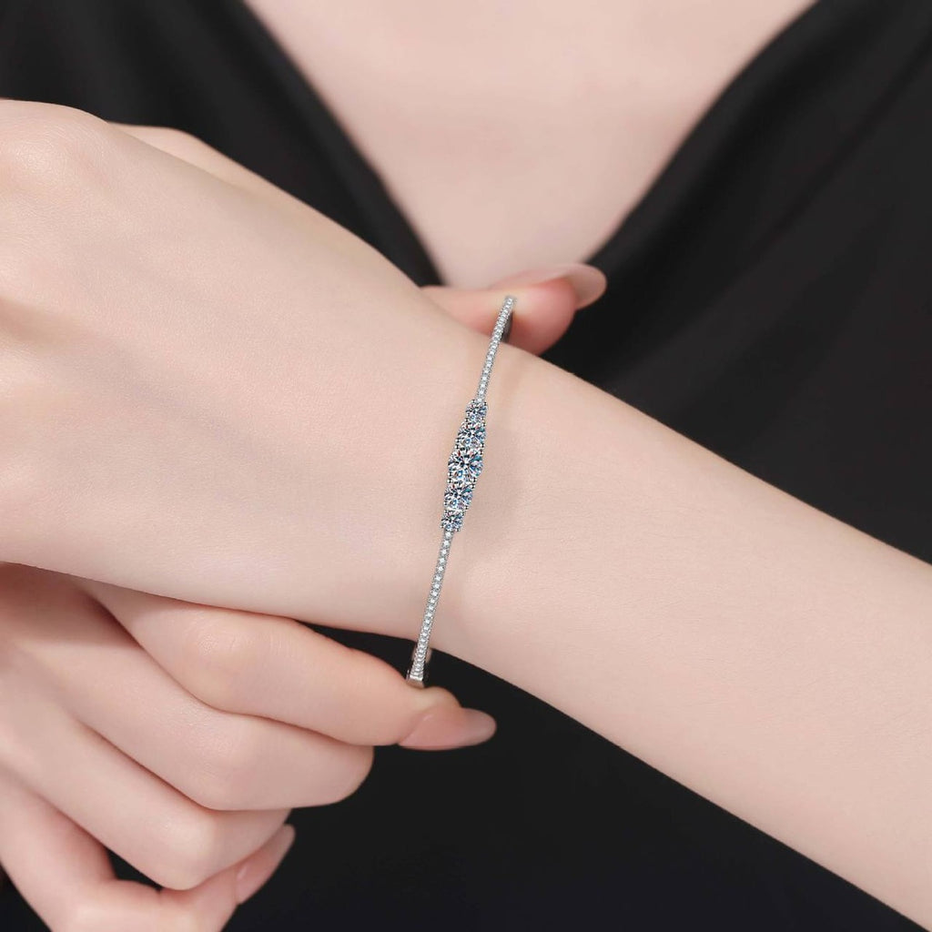 Graduated Moissanite Bangle Bracelet with CZ worn on wrist model view showing bracelet scale and fit