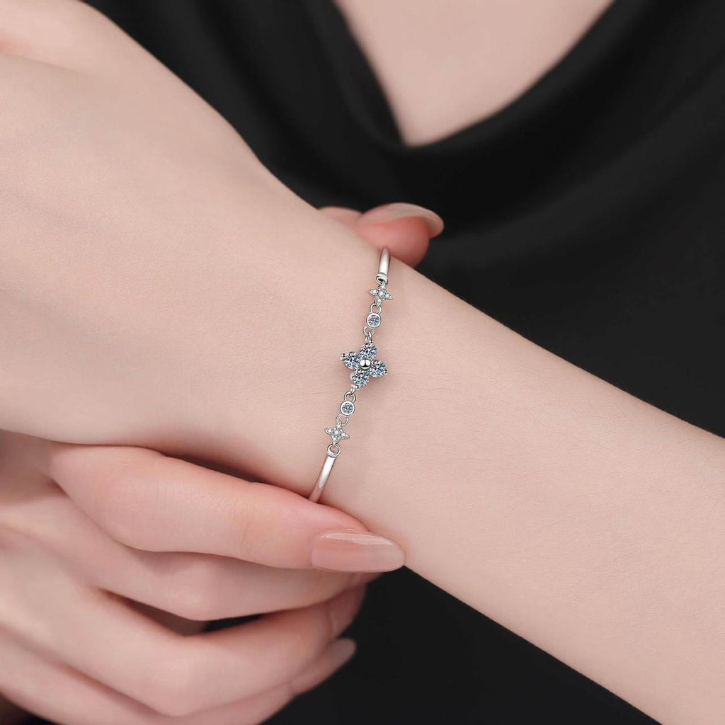 Floral Moissanite Adjustable Bangle Bracelet with CZ worn on wrist model view showing bracelet scale and fit