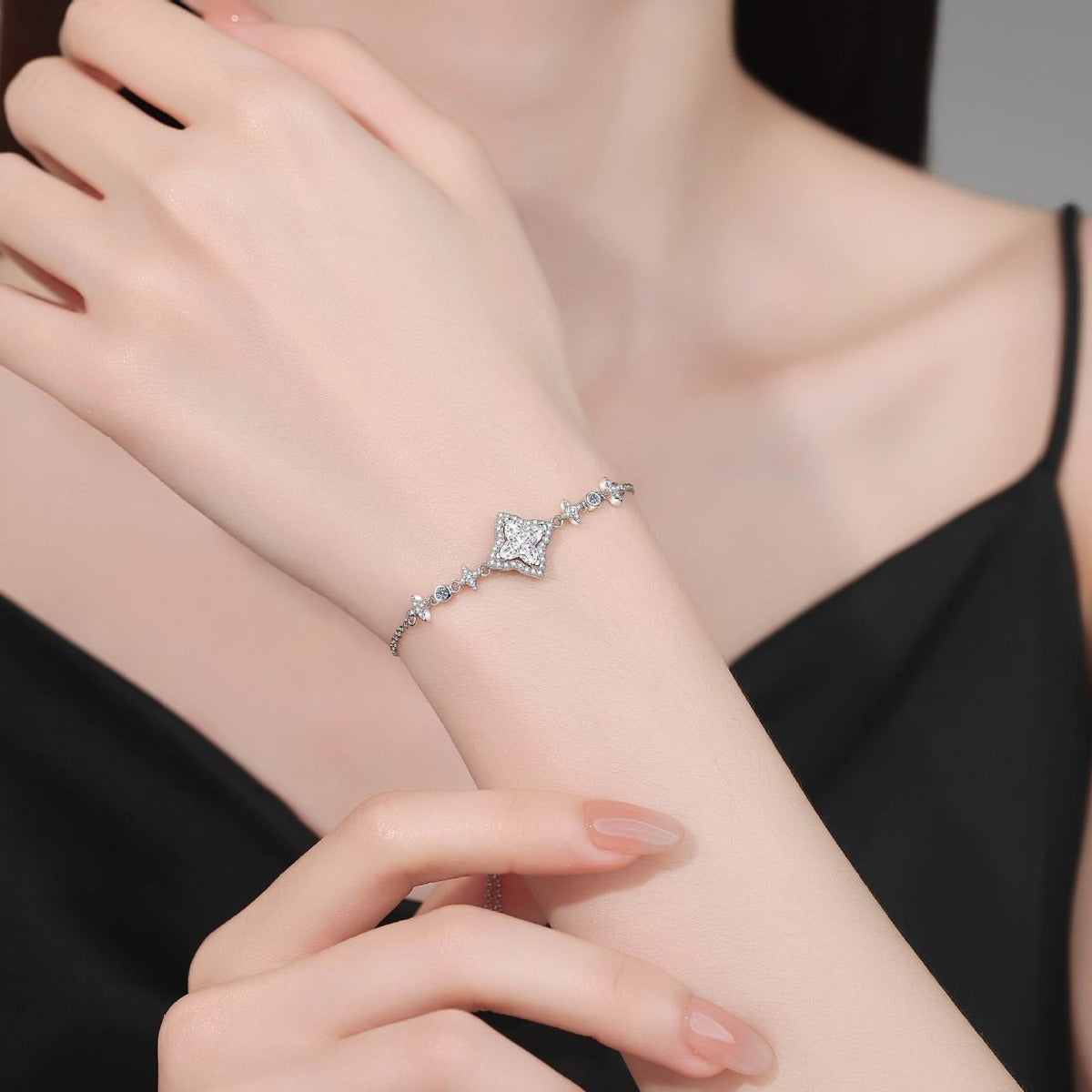 Star Cut Moissanite Adjustable Bracelet with CZ worn on wrist model view showing bracelet scale and fit