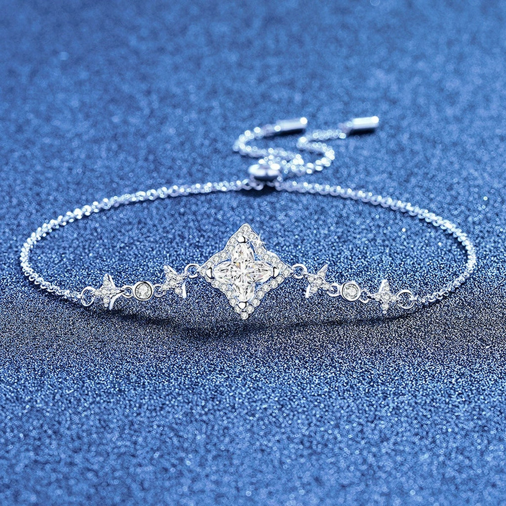 Star Cut Moissanite Adjustable Bracelet with CZ styled on blue display background showing moissanite sparkle and chain detail