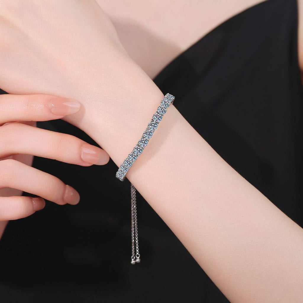 Round Moissanite Tennis Bracelet worn on wrist model view showing bracelet scale and fit