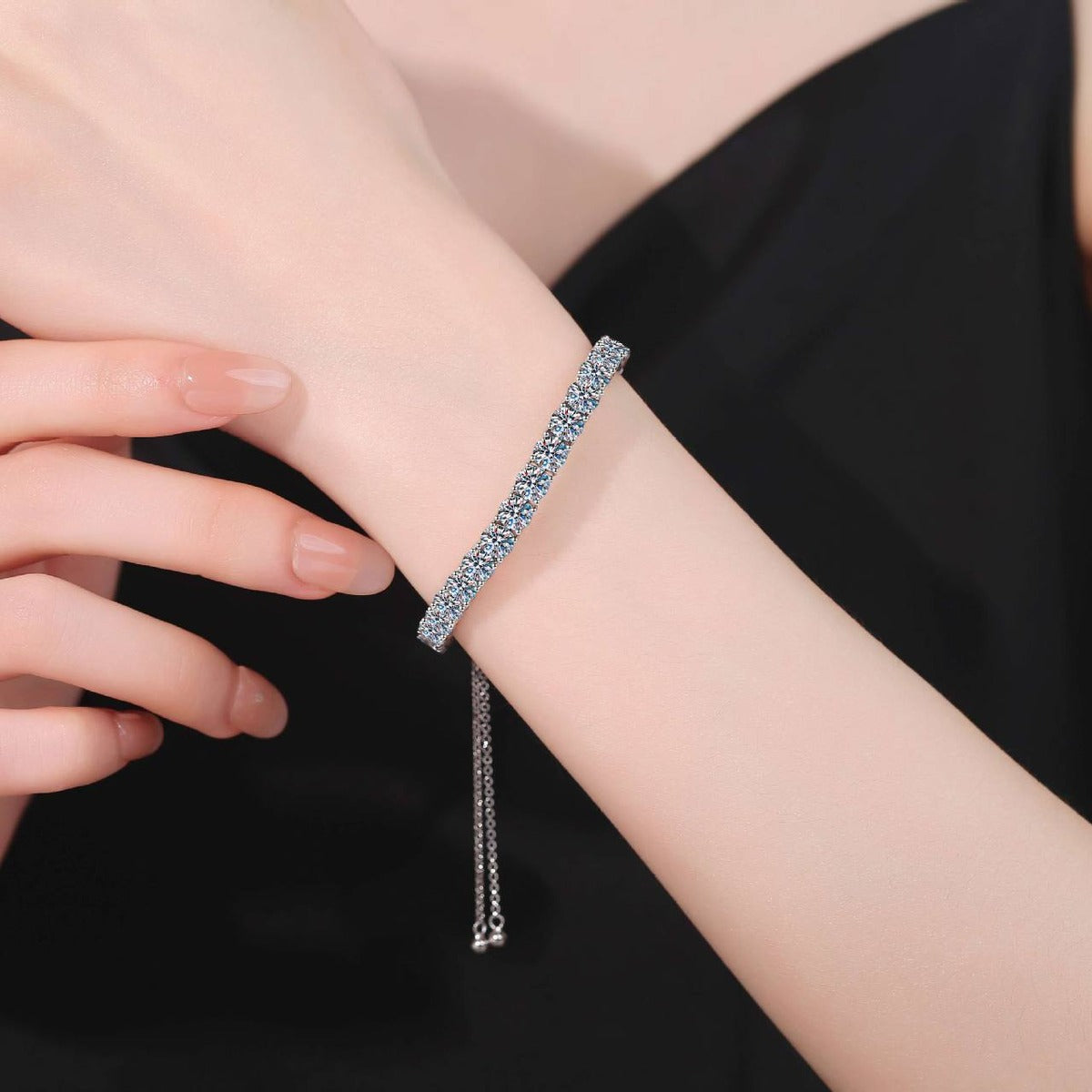 Round Moissanite Tennis Bracelet worn on wrist model view showing bracelet scale and fit