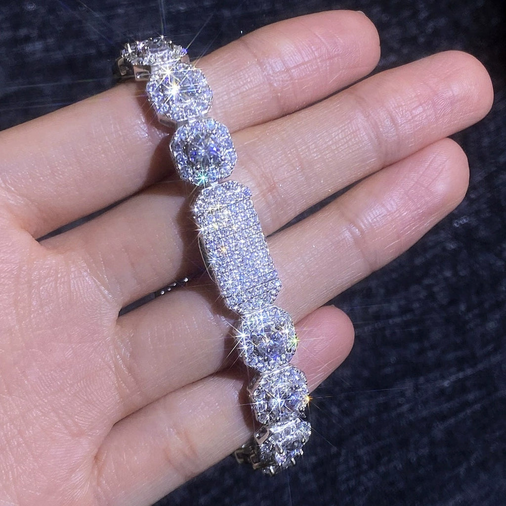 Wide Moissanite Tennis Bracelet with CZ hand-held close-up showing stone detail, width, and bracelet finish