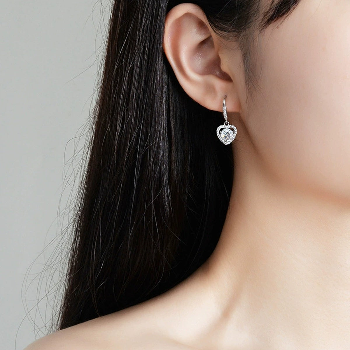 Heart Halo Round Moissanite Hook Dangle Earrings with CZ in Gold-Plated S925 sterling silver worn on ear by model showing scale, placement, and hook dangle earrings styling