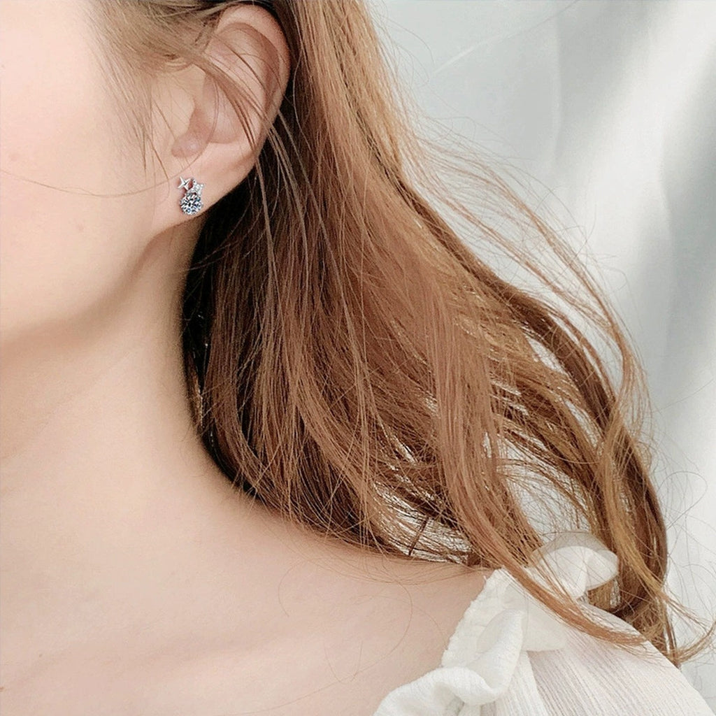 Star Round Moissanite Stud Drop Earrings with CZ in White Gold-Plated S925 sterling silver worn on ear by model showing scale, placement, and stud earrings styling