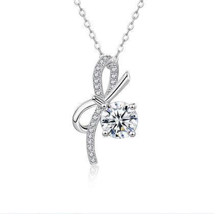 Bowknot Round Moissanite Necklace with CZ in White Gold-Plated S925 sterling silver white background product photo showing bowknot ribbon pendant with a round moissanite drop and CZ accents